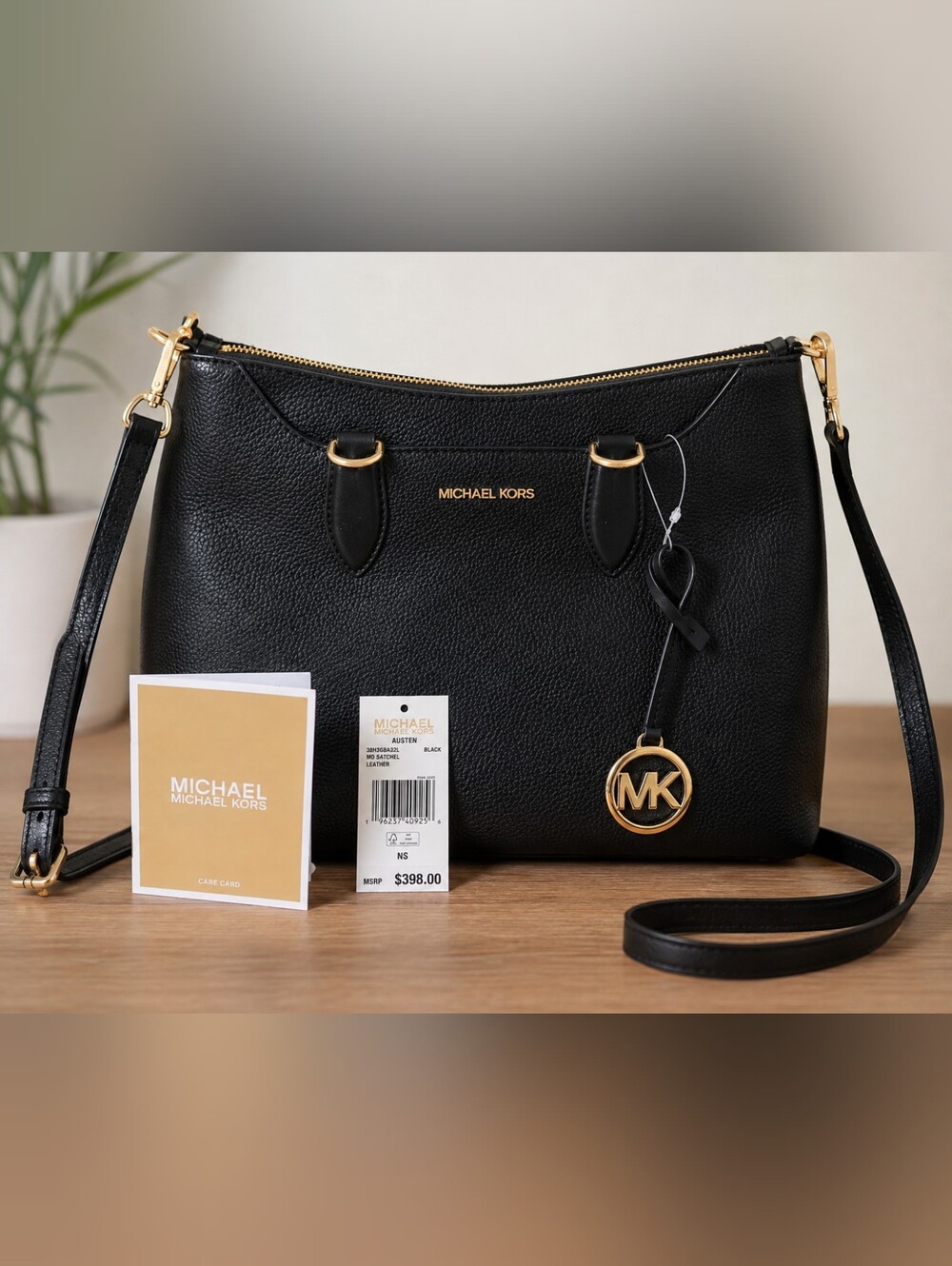 Michael Kors Black Leather Satchel with Gold Hardware